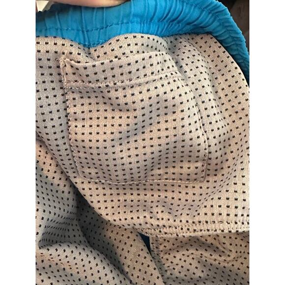 Under Armour HeatGear Men’s Swim Shorts 2XL Blue Yellow Mesh Liner Athletic - Picture 4 of 5